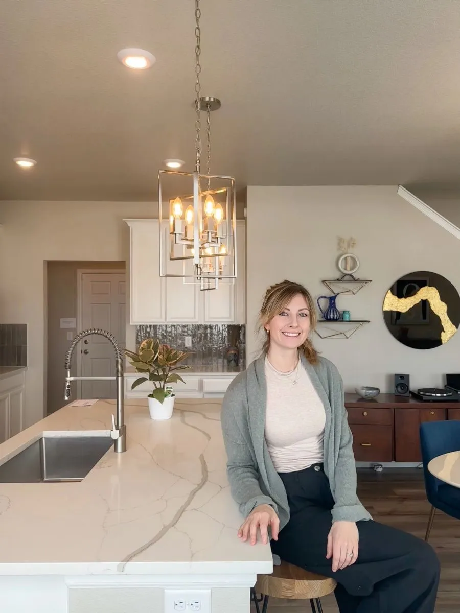 Hannah Hester smiling at a kitchen island
